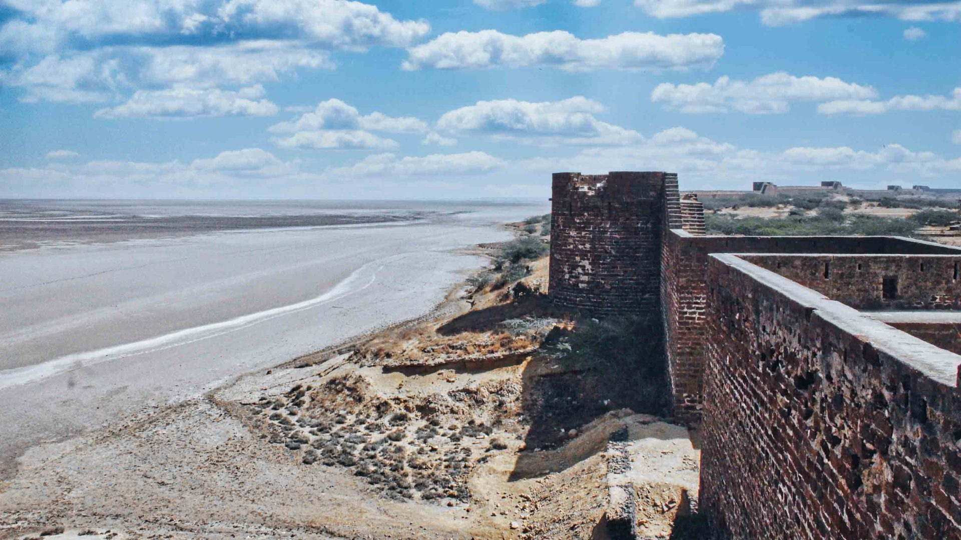 An old fort remains alongside the water.