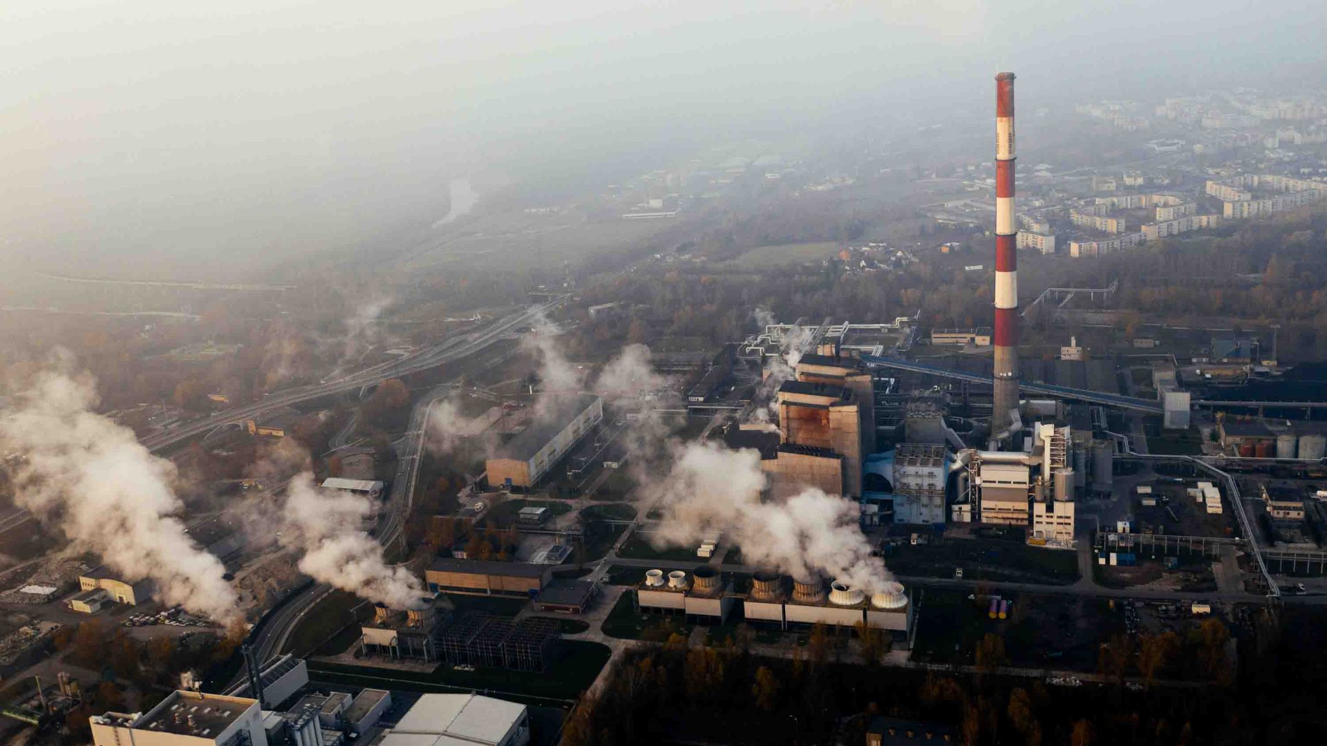 Plumes of smoke are pumped out into the atmosphere from a coal plant.