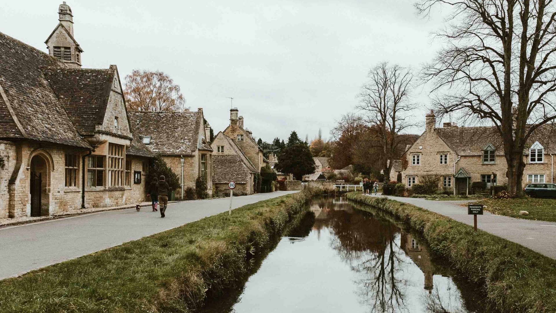 Houses line both sides of a canal.