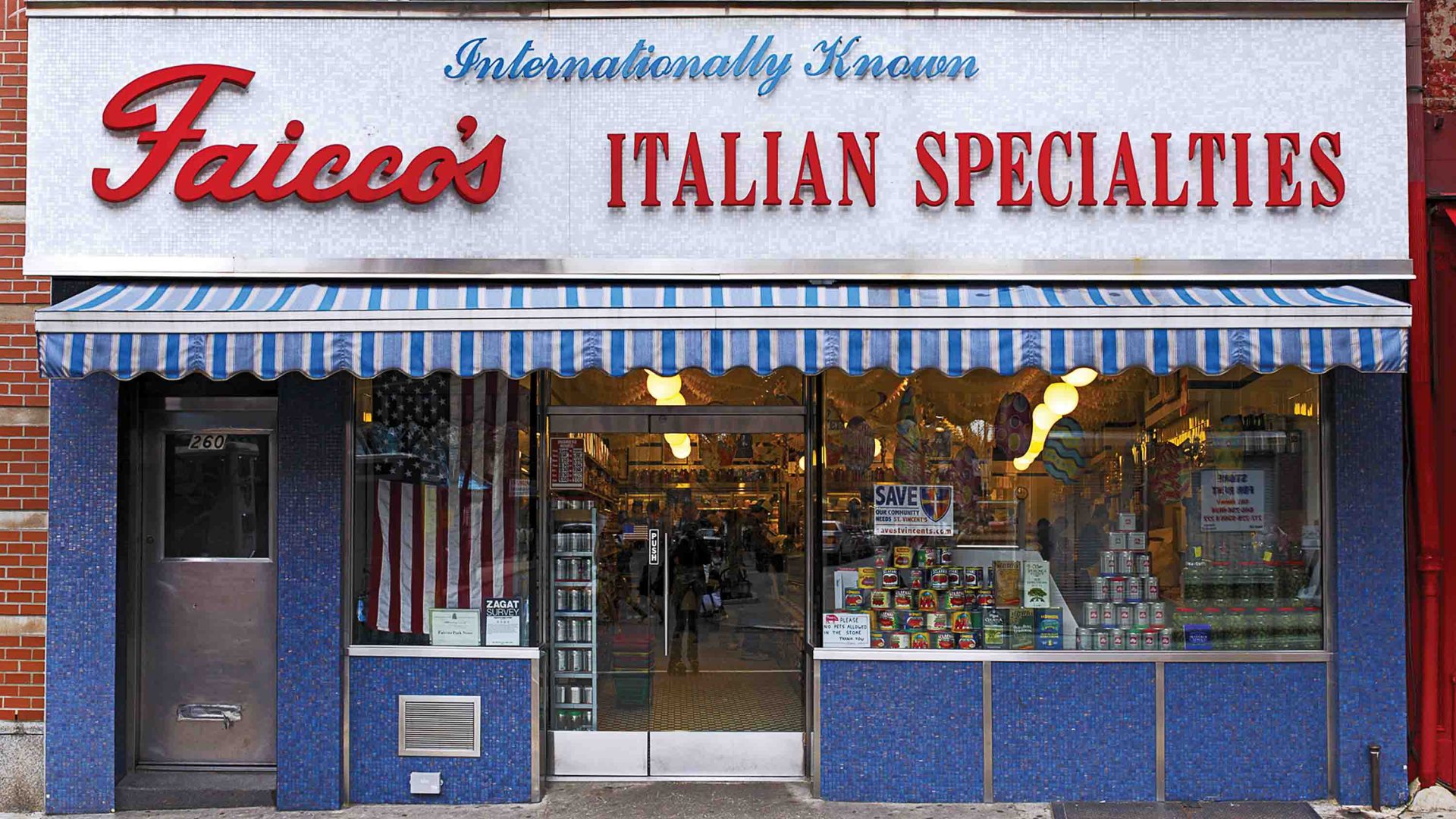 A blue, white and red store front.