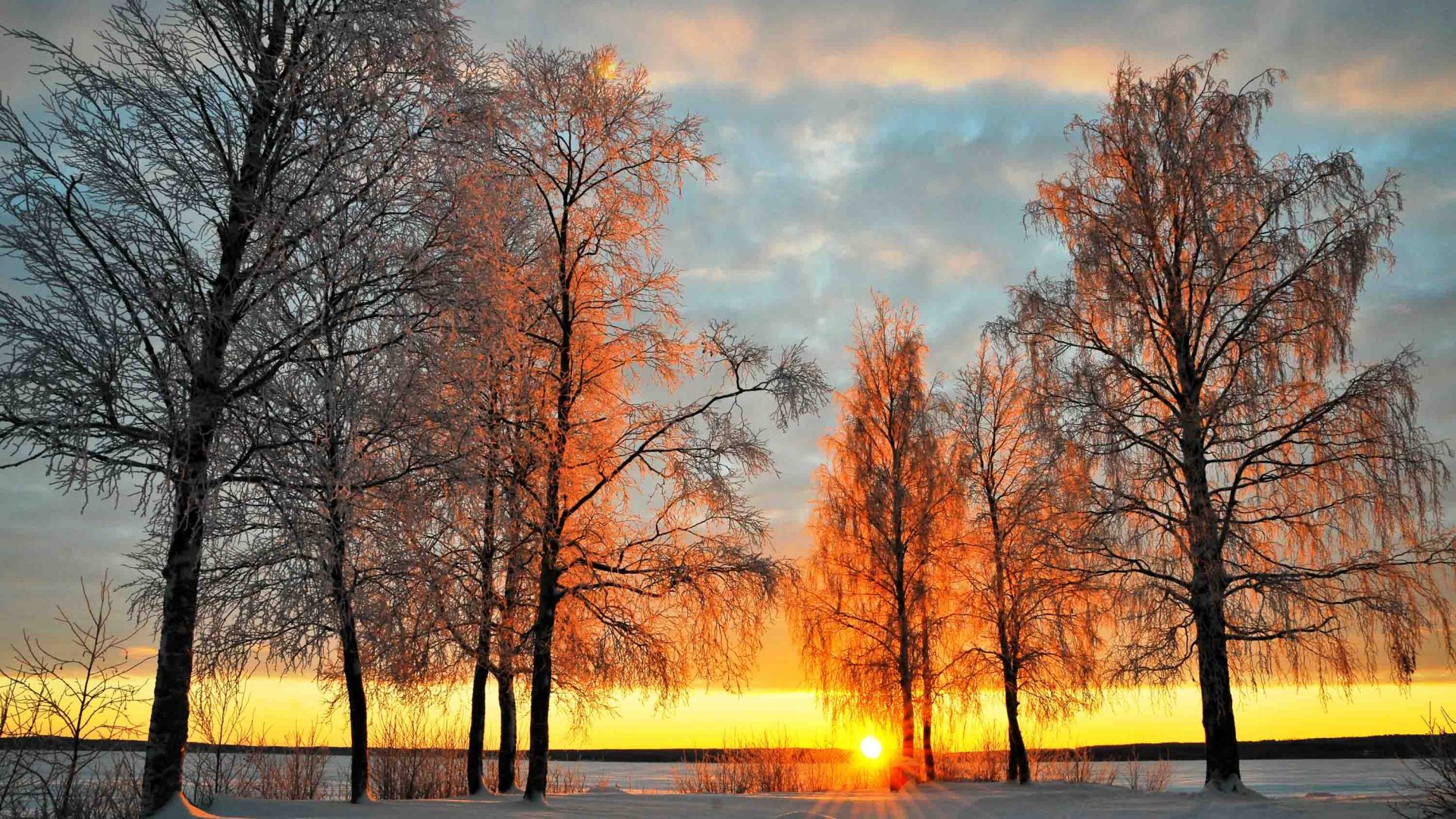 The sun sets in the small village of Jukkasjärvi, Sweden’s northernmost town.