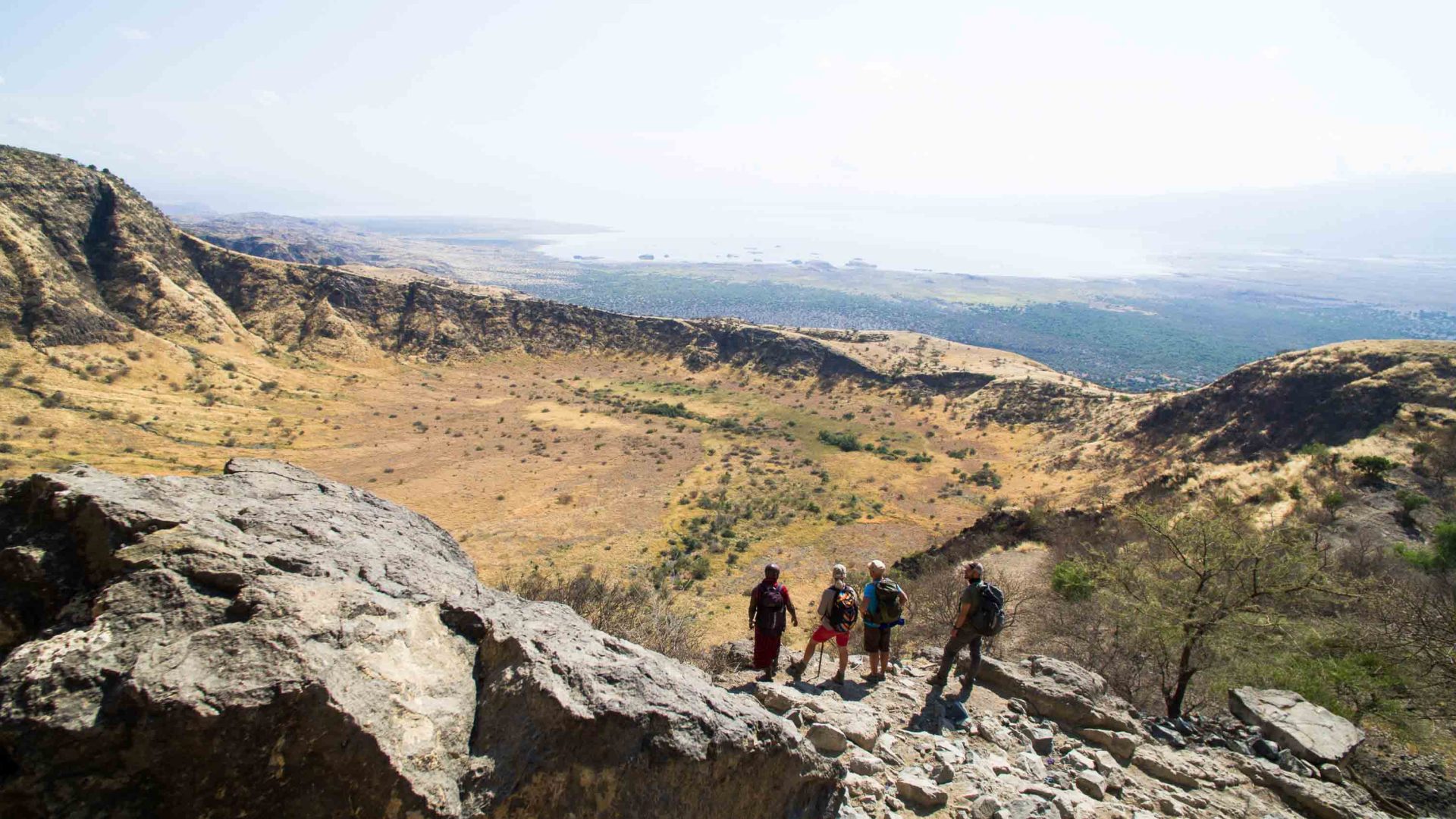 Hikers look out at the views during The Footsteps of Mankind Trek.