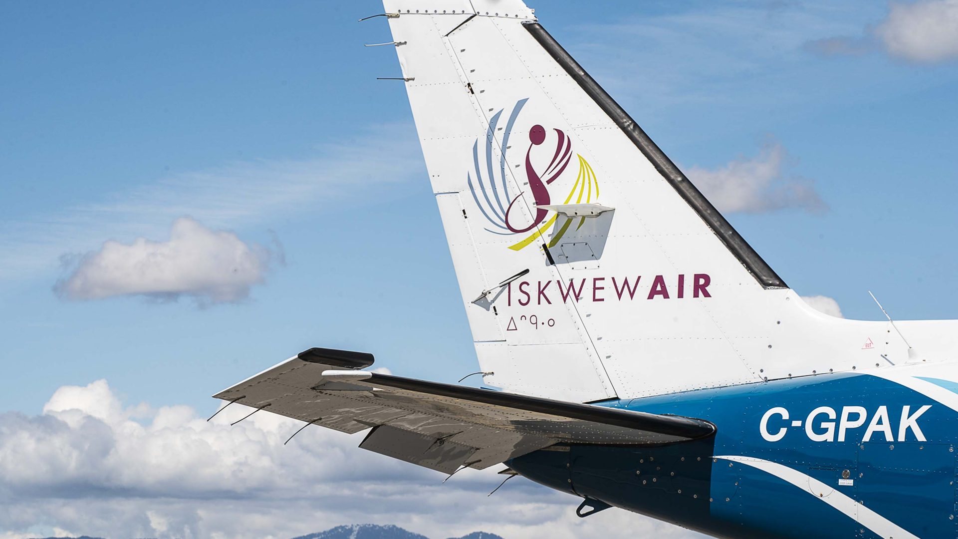 The tail of an Iskwew Air plane.