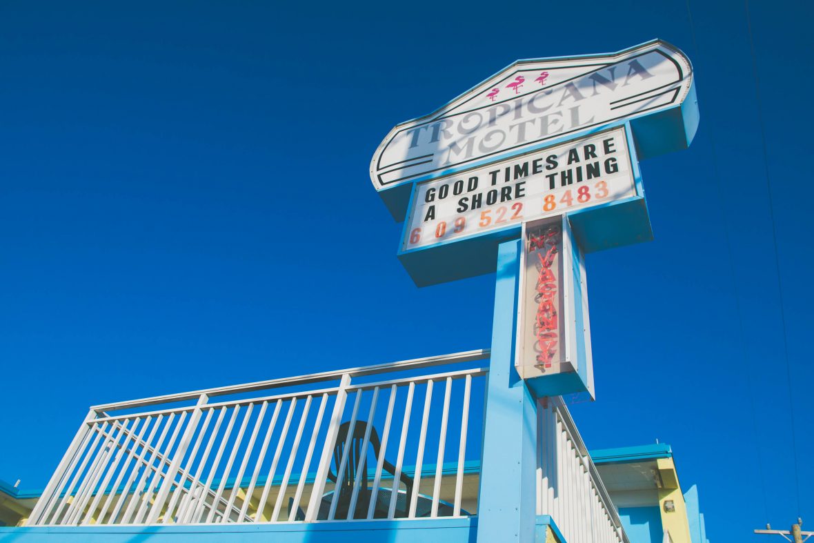 A motel sign reads "Good times are a shore thing", a reference to the location of Wildwood on New Jersey's shores.